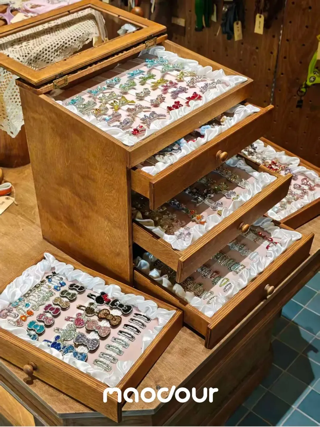 Velvet-lined drawers for dog bows and pet barrettes