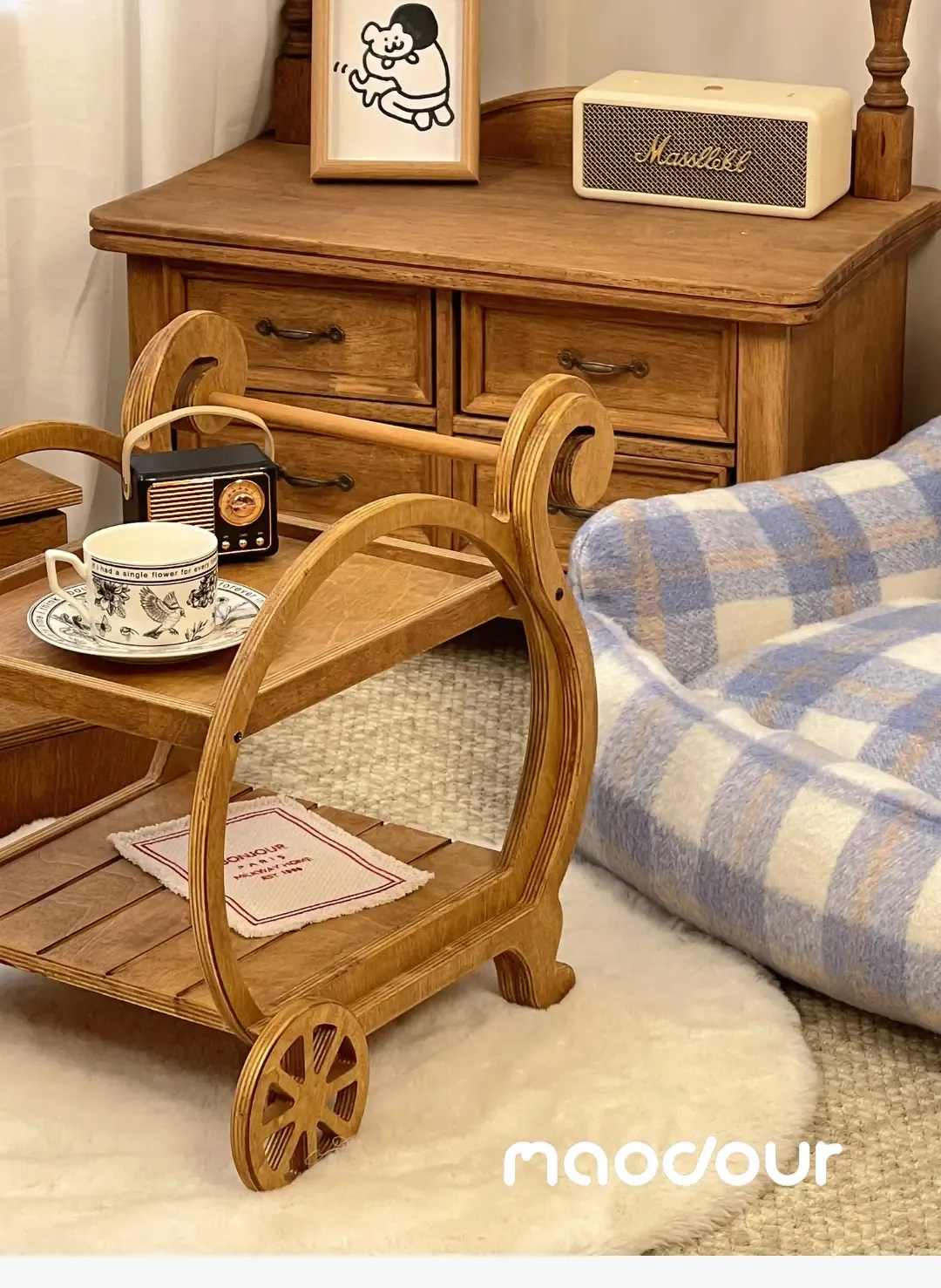 Carriage-style wheels on a French pet furniture cart
