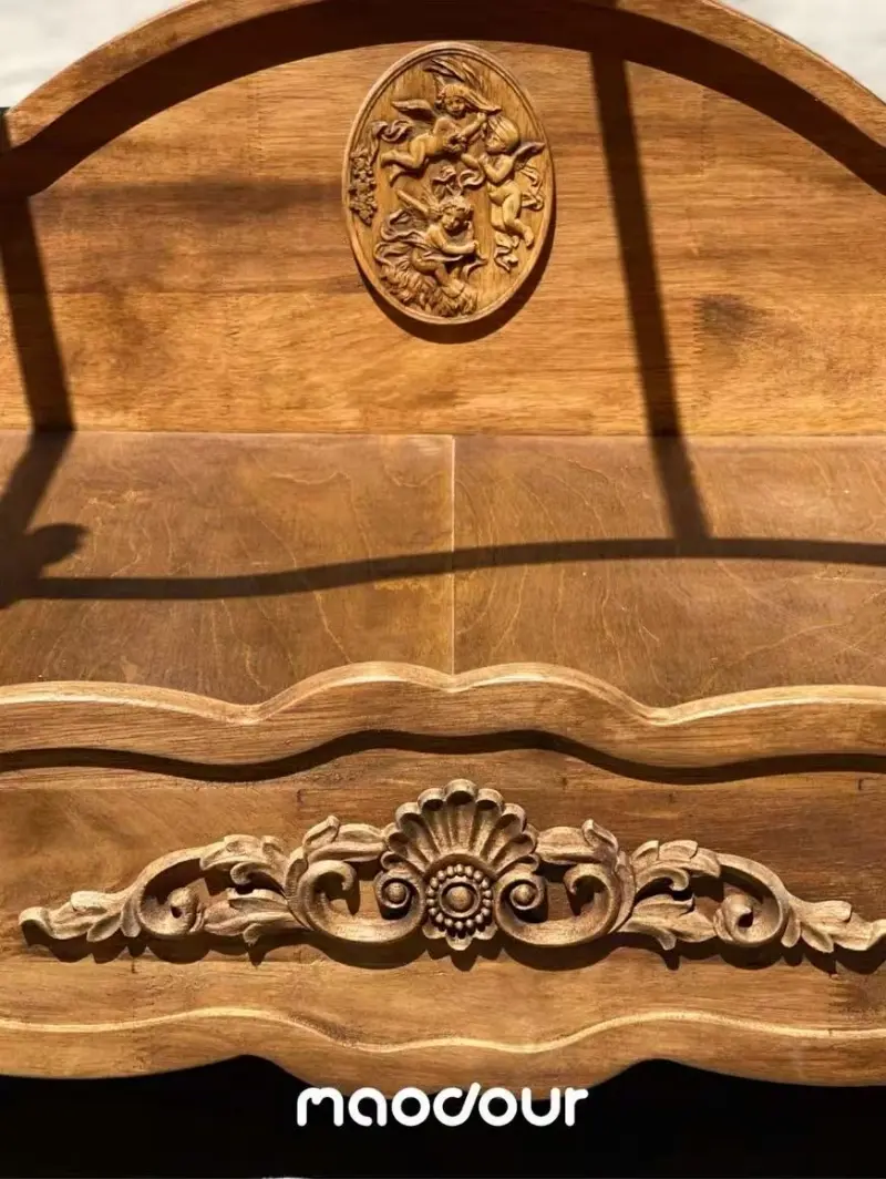 Carved solid wood detail on handcrafted Maodour pet furniture